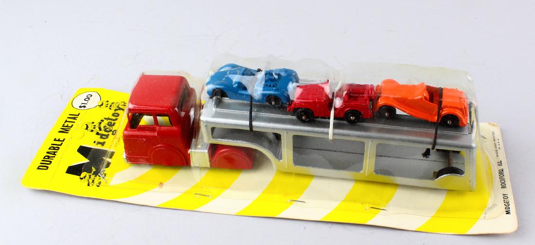 Midget Toy Car Carreir Mint in Package: Midget Toy Car Carreir Mint in Package. Diecast set never opened. (Plastic loose and has been stapled).