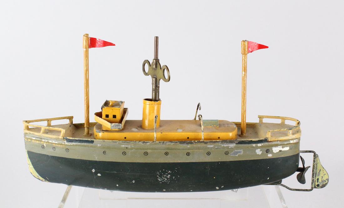 Ives Merchant Marine Gunboat: Ives Merchant Marine Gunboat. 1920s Tinplate ship 9 inches long. Working wind up shipl