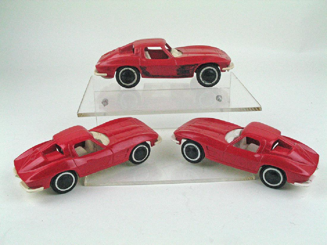 Corvette Car Lot 1960\'s: Corvette Car Lot 1960\'s, plastic, 6\", one missing wheel