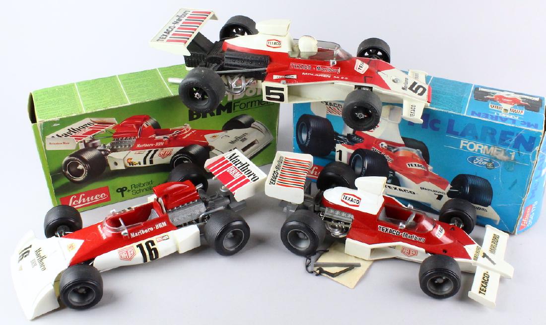 Schuco Marlboro Race Cars in Box: Schuco Marlboro Race Cars in Box. Ford BRM, McLaren, 2 in box, one loose.