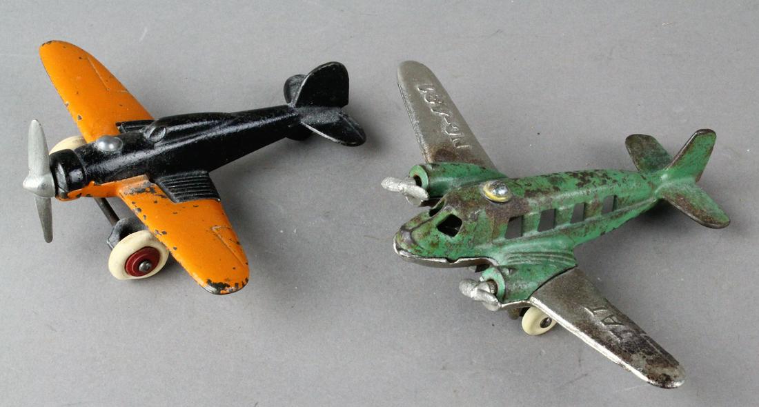 Hubley Cast Iron Airplanes TAT: Hubley Cast Iron Airplanes, dual prop TAT passenger plane and single engine monocoupe airplane. 5 3/4 inch wingspan on the TAT.