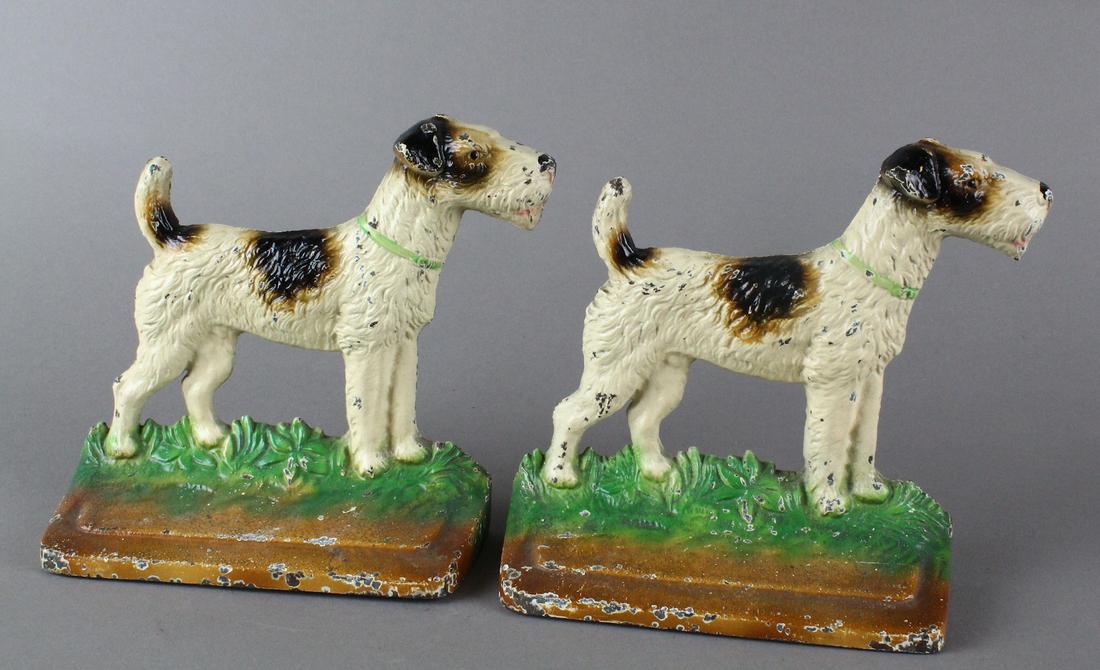 Fox Terrier Cast Iron Doorstops/Book Ends: Pair of cast iron terrier door stops. Excellent original paint.