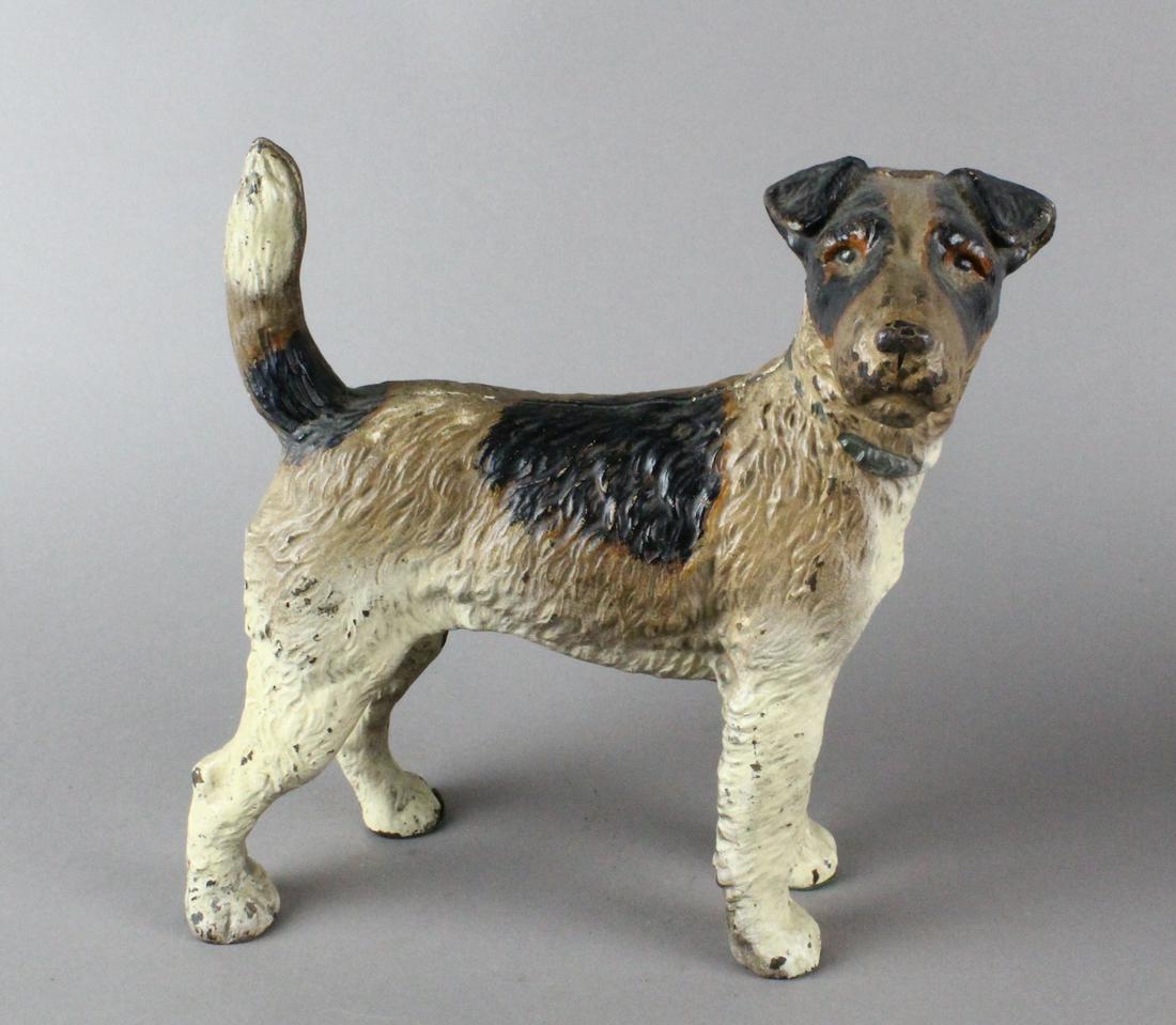 Hubley Fox Terrier Door Stop: Hubley Fox Terrier Door Stop. Excellent original paint. 8 3/4 inches wide.