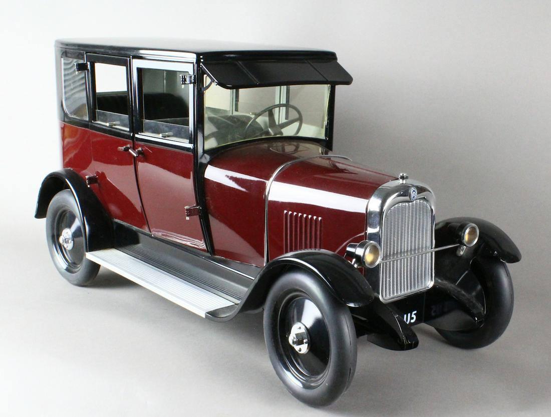 Citroen B14 Taxi Limousine Tinplate 21 Inches: Citroen B14 Taxi Limousine. 21 inches long. Exceptional detail including roll down windows, opening doors, electric powered lighting, differential axle, nickel grille. Battery untested, appears comple