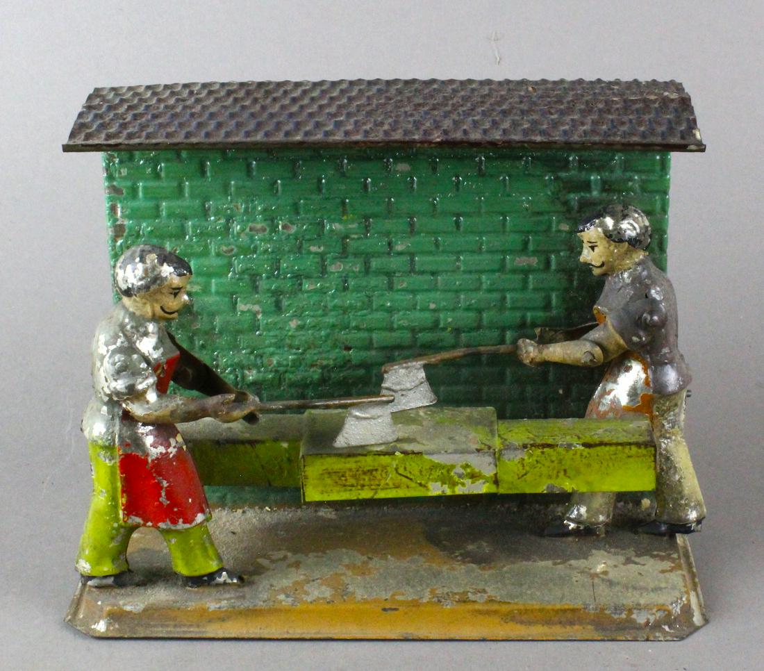 Bing German Tin 2 Butchers with Axes: Bing German Tin 2 Butchers with Axes at chopping blocks. Pre-War Germany steam tin toy featuring 2 chopping butchers.