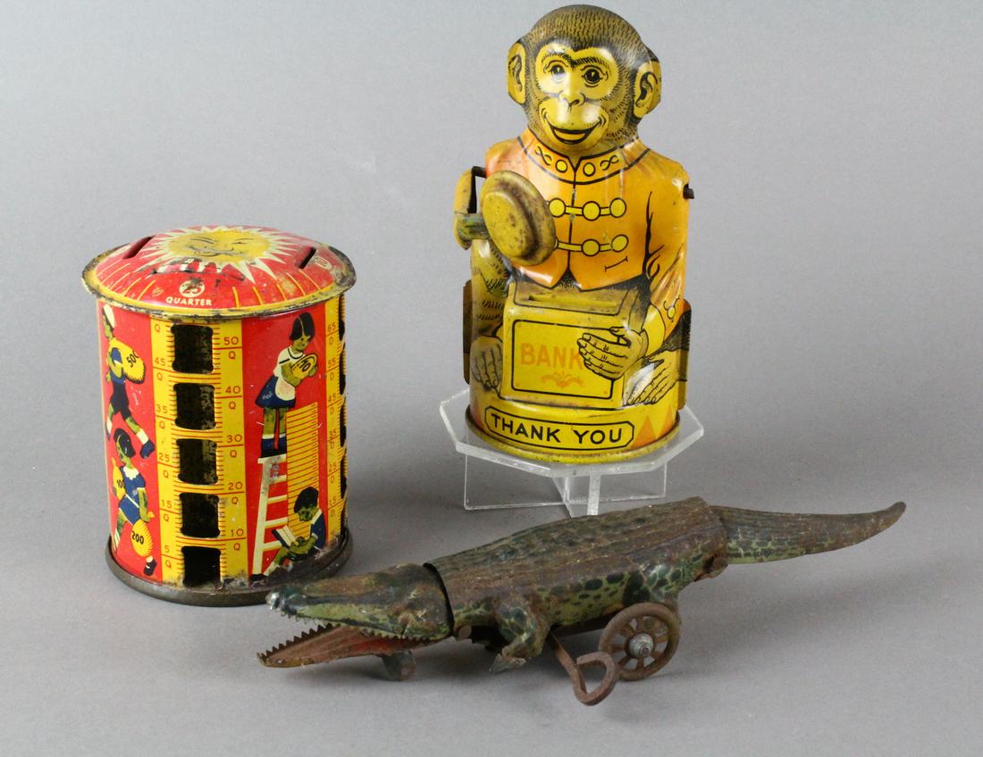 Lehmann Aligator Chein Monkey Bank &Tin Bank: Lehmann German Tin Aligator, Chein Monkey Bank &Tin Kiosk Bank. Aligator is not working with wear. Others with play wear.