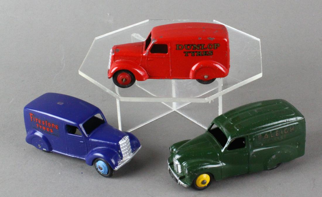3 1930s Dinky Tin Advertising Delivery Trucks: 3 1930s Dinky Tin Advertising Delivery Trucks. Raleigh Cycles, Dunlop Tyres and Firestone Tyres (tires). Excellent advertising trucks.