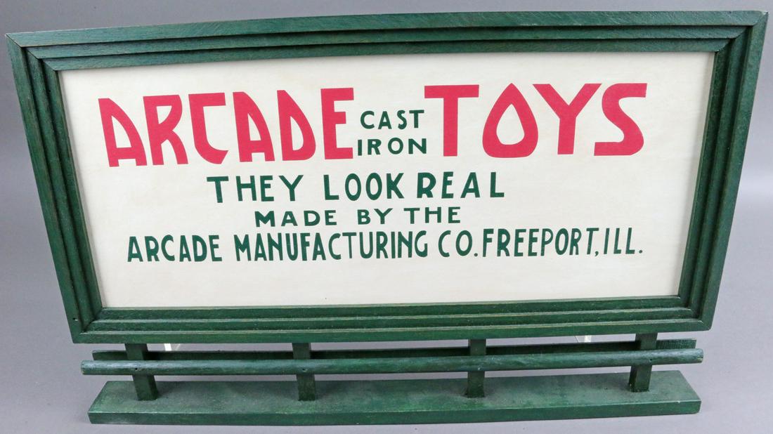 Arcade Toys Wood Sign: Arcade Toys Sign, wooden in construction with cardboard insert. Size: 14 1/2" tall.