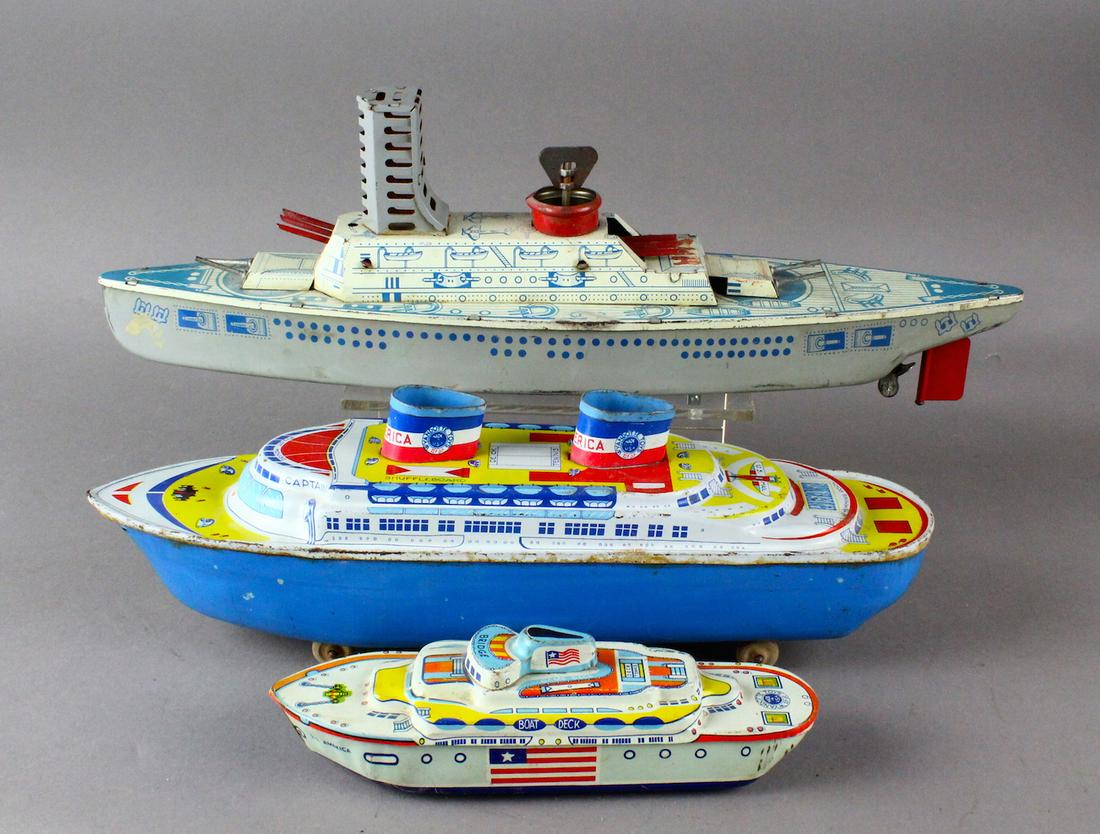 Wyandotte Cruise Ships & Wolverine Battleship: Wyandotte Cruise Ships & Wolverine Battleship Tin Wind ups. Working, some litho wear.