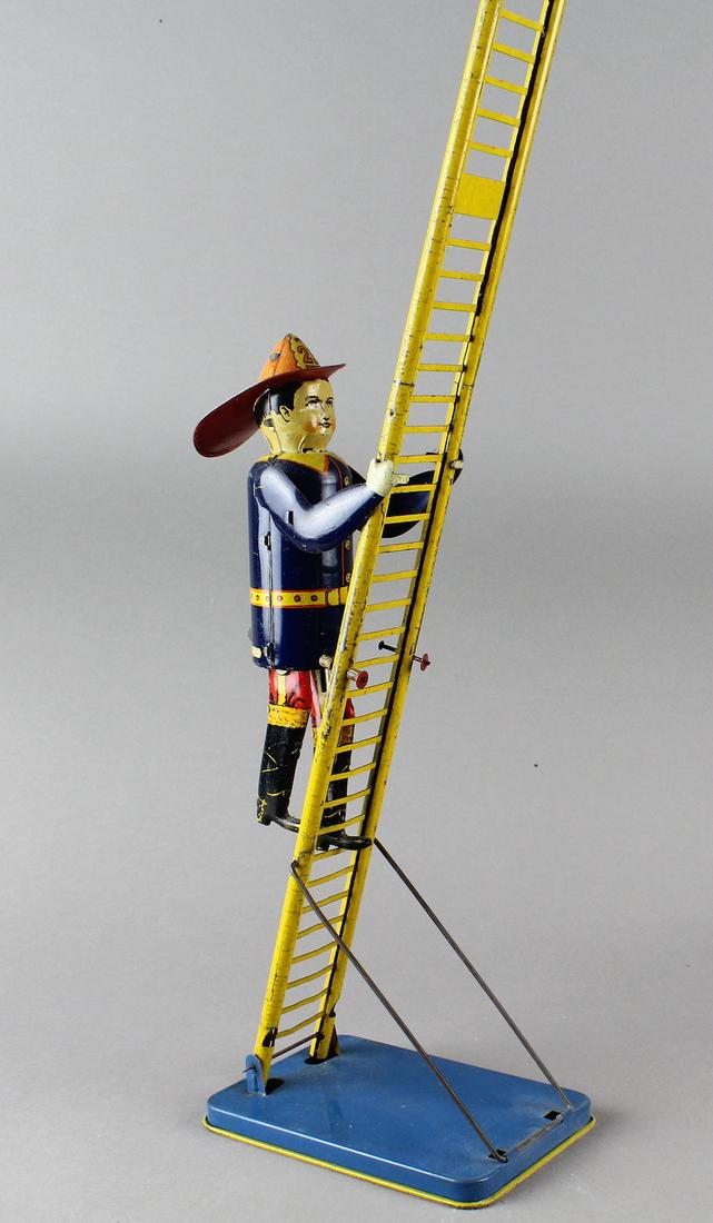 1930s Marx Climbing Fireman: 1930s Marx Climbing Fireman tin toy. Early version, wind up not working.