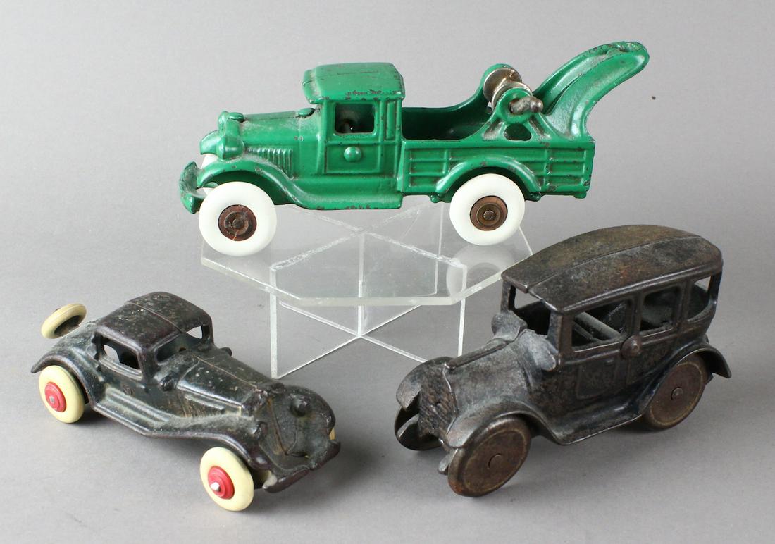 Cast Iron Hubley, Williams, Dent Cars & Wrecker: 1930s Cast Iron Cars & Wrecker. Repainting, sedan original.