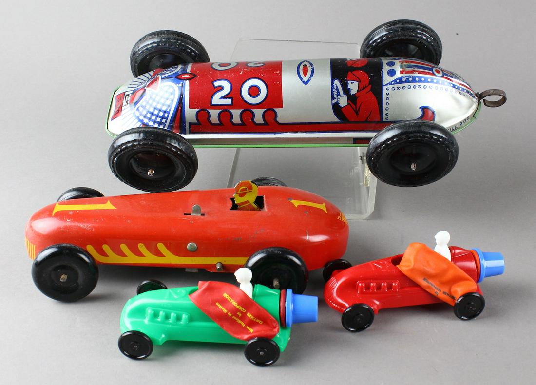Tin Race Cars & Chrysler Plastic Indy Cars: Tin Race Cars & Plastic Indy Cars. Ellenee, early pull wind racer, 2 Chrysler promo balloon powered race cars. All in excellent original condition.