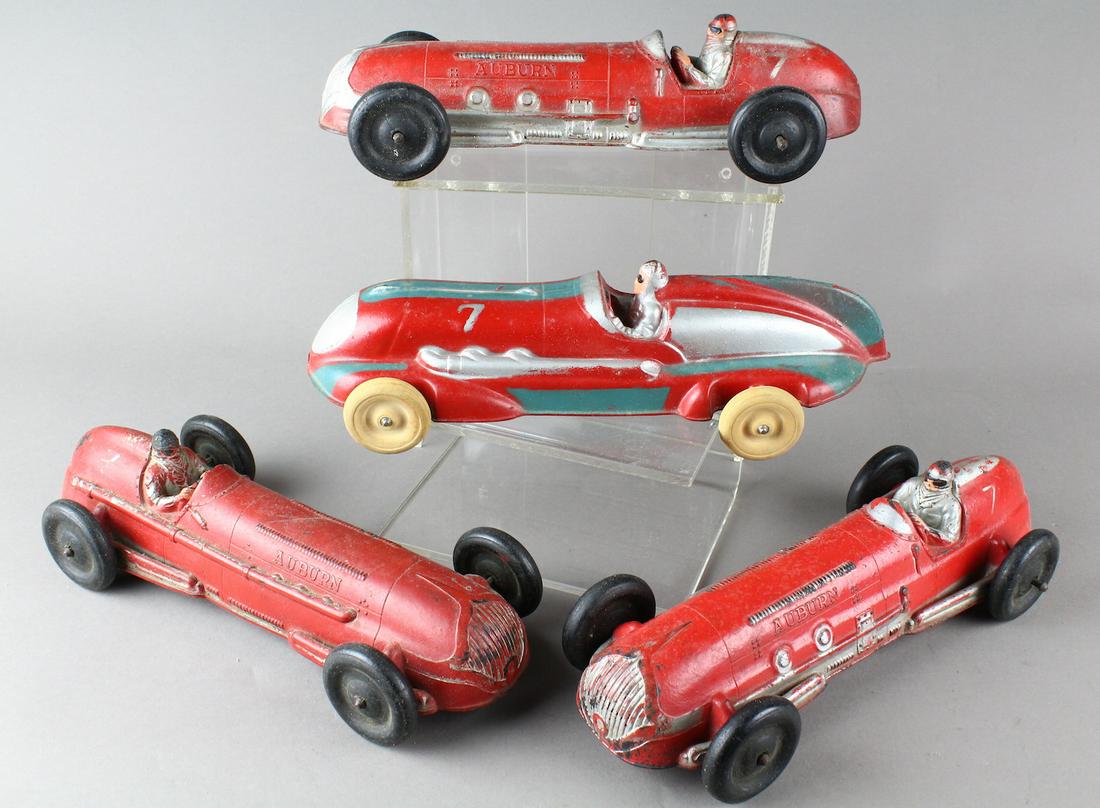Large Streamlined Race Cars with Drivers: Large Streamlined rubber Race Cars with Drivers. Auburn and Arcor largest racers 11 inches long.