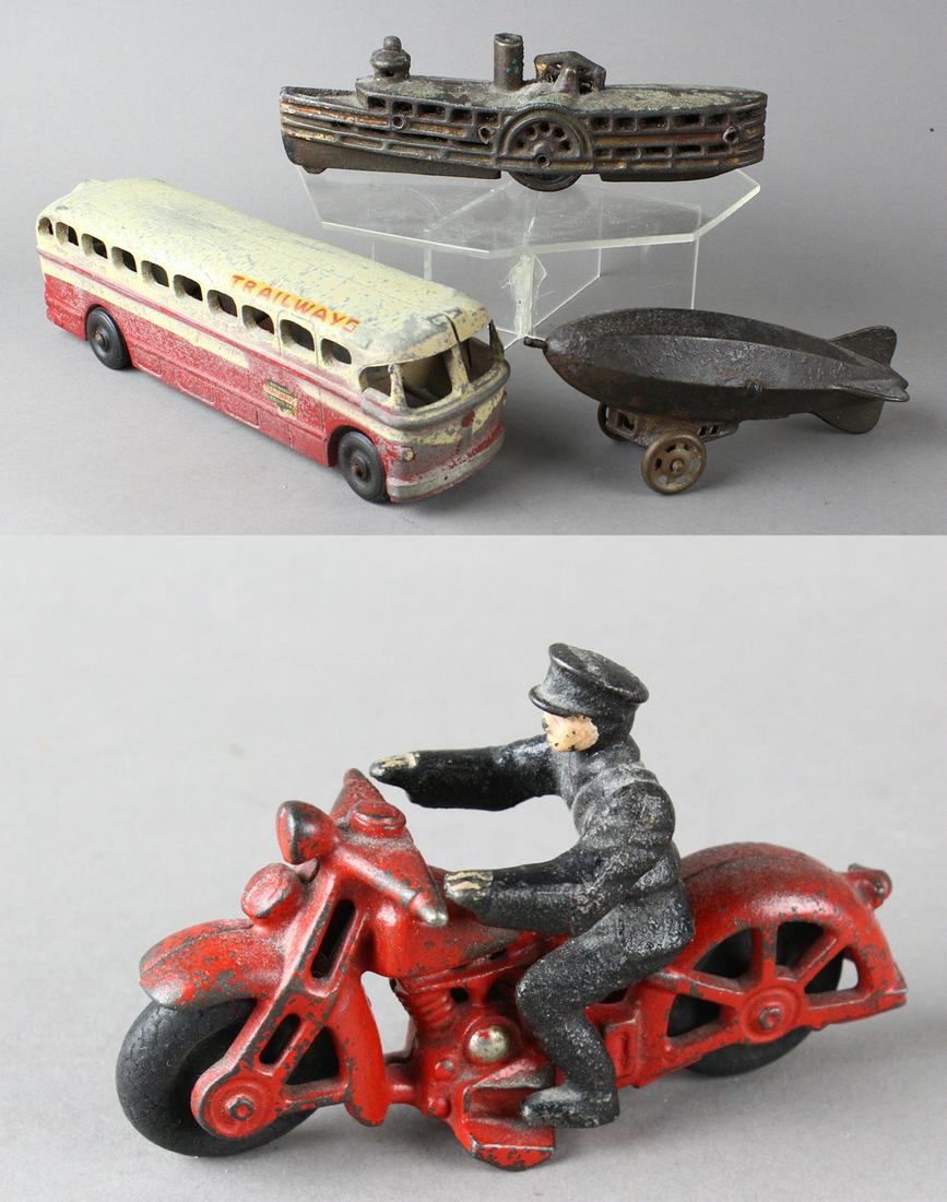 Hubley Motorcycle & Arcade Bus Zeppelin & Boat: Hubley Motorcycle & Arcade Bus, cast iron Zeppelin & Boat. Nice cast iron lot. Longest 9 inches - Bus.