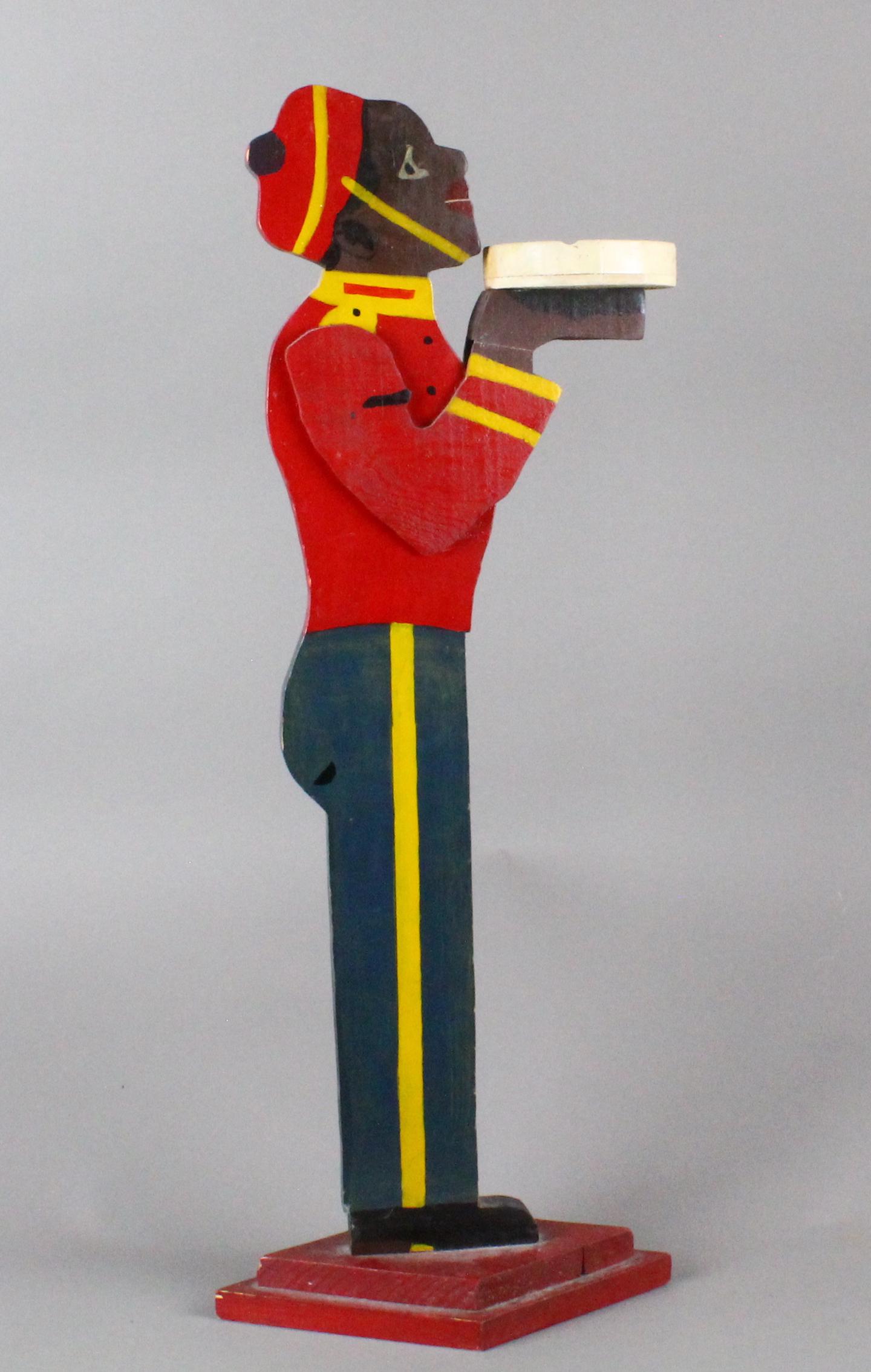 Black Bellhop Smoking Stand: Black Bellhop Smoking Stand. Folk art butler stand of porter or bell hop dressed man 30 inches tall.