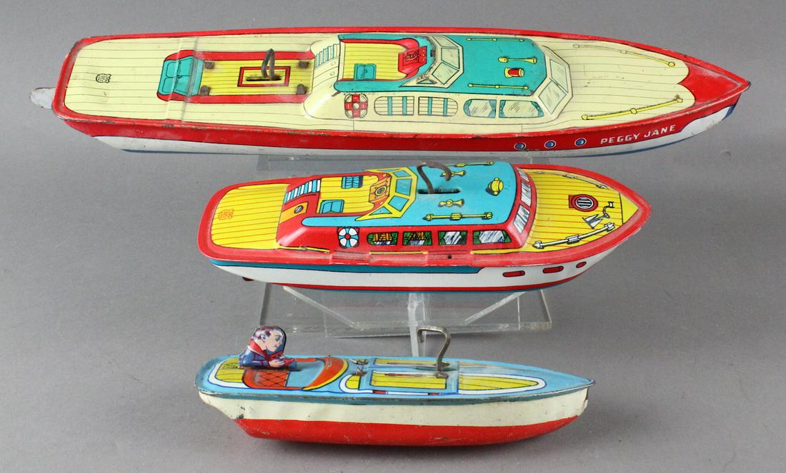 J. Chein Tin Wind Up Boats: Three J. Chein Tin Wind Up Boats. Longest 14 1/2 inches. Cabin cruiser is only working.