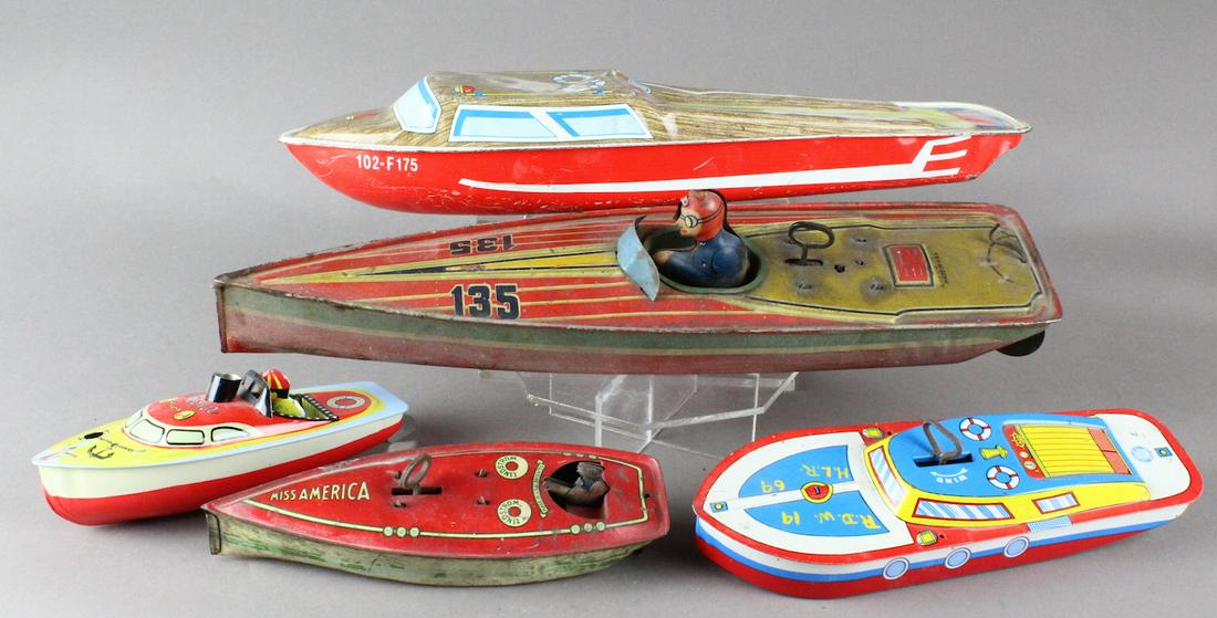 Lindstrom Tin Toy Boats & Others: Lindstrom Tin Toy Boats along with Ohio Art boats and one Schylling. Large Lindstrom speedboat is 15 inches and working.