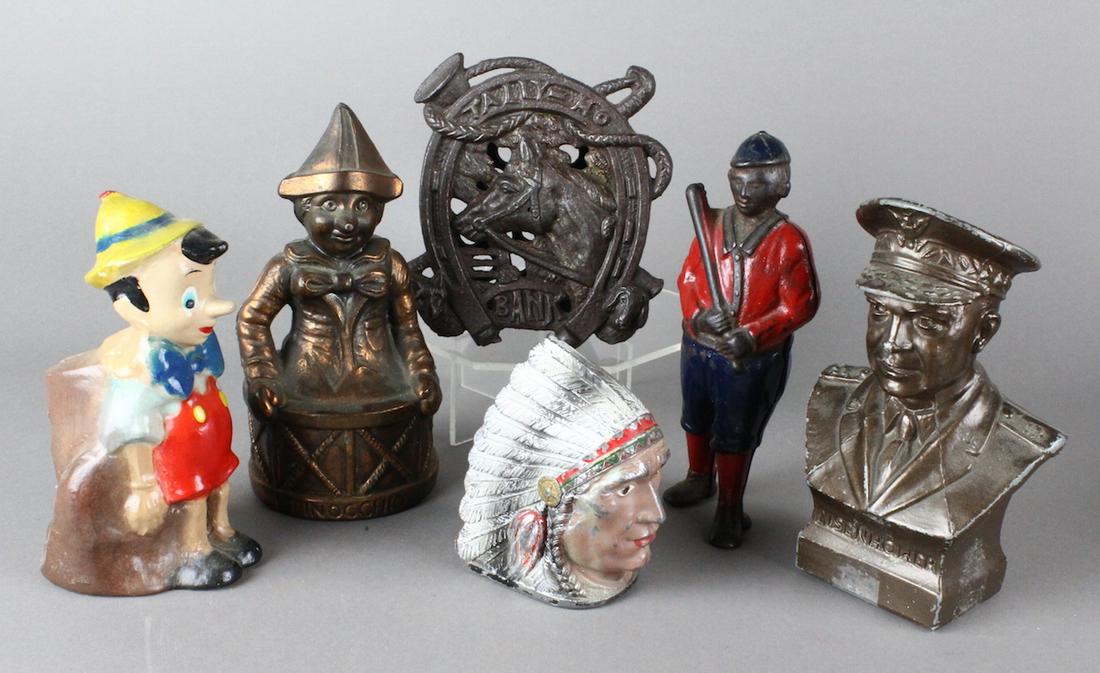 Figural Still Banks, Baseball Player, Indian & Tally Ho: Dwight Eisenhower, Williams Baseball player, 2 Pinocchio banks (one not metal), aluminum Indian head, and one Tally Ho Bank- Chamberlain & Hill England.