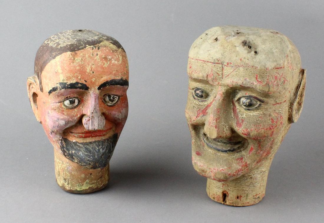 Carved Wooden Puppet Heads Folk Art Pair: Carved Wooden Heads Folk Art Pair. Well done folk art hand carved heads, came with the last lot of Frank Marshall ventriliquist carved heads. These may or may not be by the same carver, but were with 