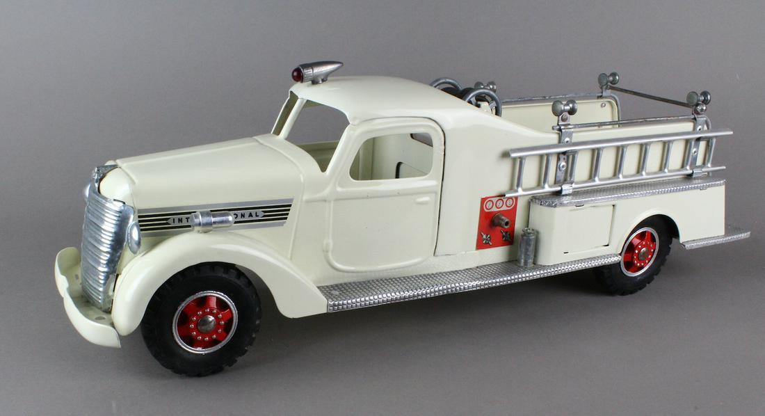 New Era Pressed Steel IH Fire Enginge: New Era International Harvester Fire Truck. Near mint magnificent detailed truck, No. 3 made.