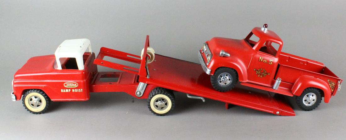 Tonka Ramp Hoist Truck & No. 5 Fire Chief: Tonka pressed steel Ramp Hoist Truck & No. 5 Fire Chief Pick Up Truck. Working original scarce Ramp Hoist truck and restored No. 5 pick up truck Fire chief. Great looking and working combination.