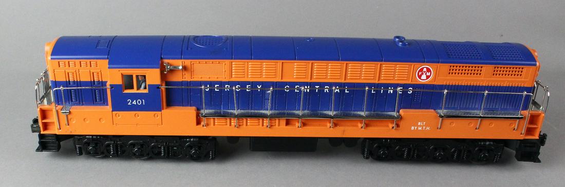 MTH Rail King New Jersey Central Engine NJC 2401: MTH Rail King New Jersey Central Engine NJC 2401. Appears near mint with rail pad. No box.