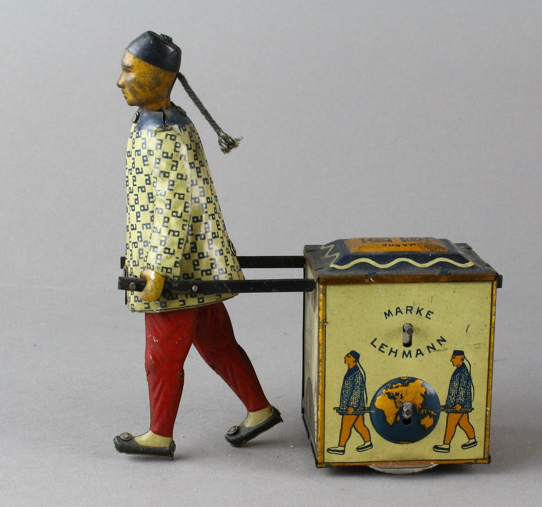 Lehmann Nu-Nu Chinaman Tea Cart: Lehmann Nu-Nu Chinaman Tea Cart. German tin tea cart c.1910. Fine original working toy.