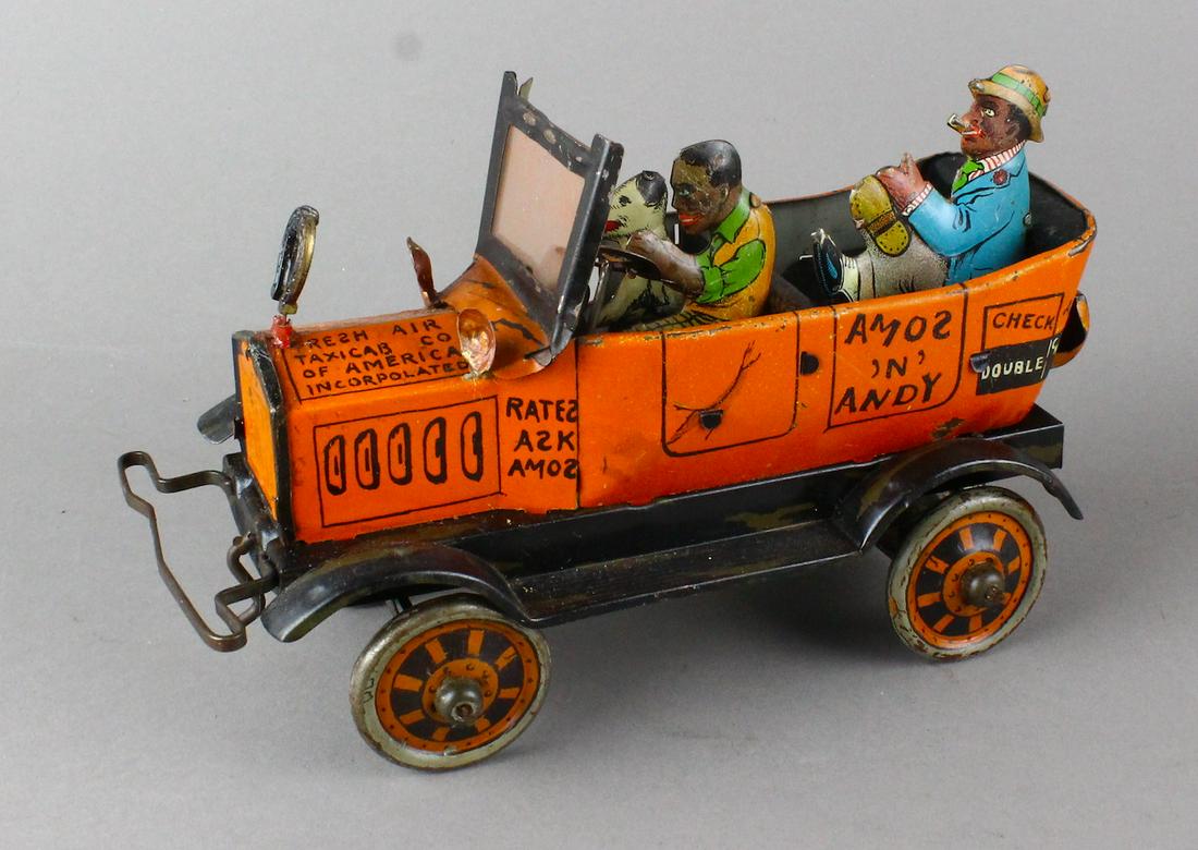 1930s Marx Amos N' Andy Fresh Air Taxi: Marx Amos N' Andy Fresh Air Taxi. 1930s minstrel radio show toy taxi. Fine working original tin toy.