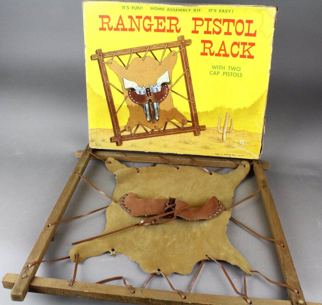 2 Scarce Kilgore Boxed Toys: Kilgore Kitchen Charmers Kitchen Set in Box and Kilgore Ranger Pistol Rack in fine condition, no cap guns original box. Scarce