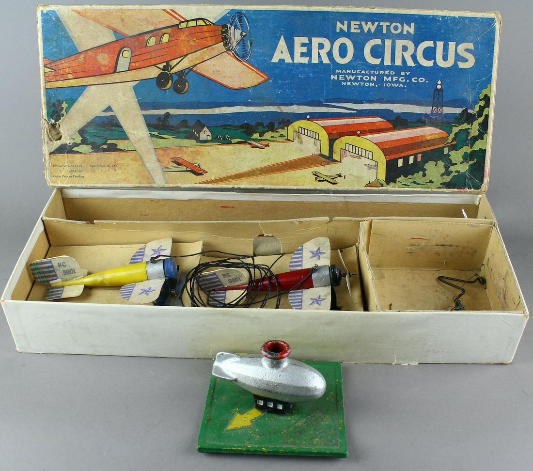 Newton Aero Circus Airplane Toy in Box: Newton Mfg. Newton Iowa, Aero Circus Airplane Toy in Box. Complete with cast iron Zeppelin base. Excellent.