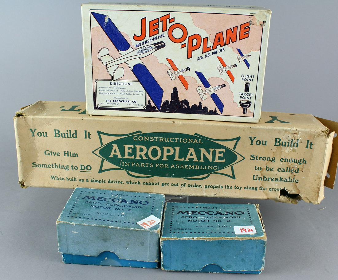 Aeroplane Boxed Toys & Meccano Aero Motors: Two Meccano Boxed Aero Clockwork Motor No. 2, England made Aeroplane Construction toy (wrapped inside pristine), and Jet O Plane with launcher by the Abbocraft Co. of Chicago.