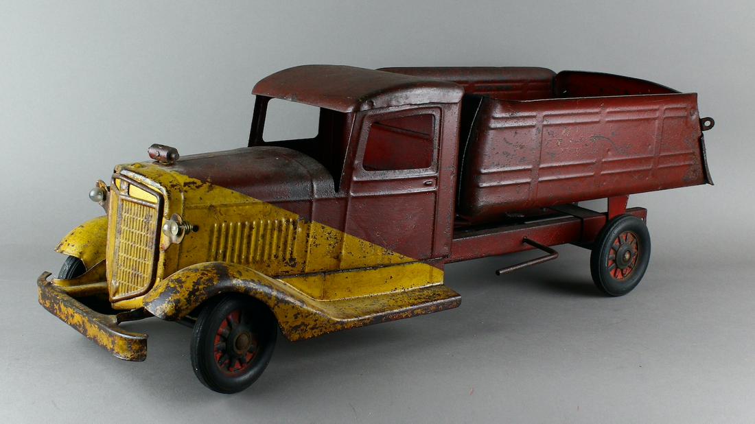 1938 Buddy L International Dump Truck: 1938 Buddy L International Dump Truck 24 1/2 inches long. Scarce truck with lights. Original unrestored condition.