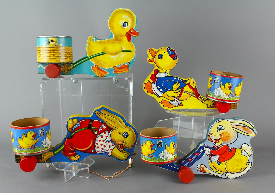 Fisher Price Duck & Rabbit Easter Carts: Fisher Price Duck & Rabbit Easter Carts. Excellent bright litho on these Easter theme carts 8 inches long.
