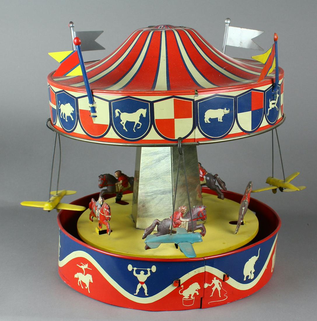 Wolverine Tin Airplane & Horse Carousel: Wolverine Tin Airplanes & Horses Merry Go Round. Excellent large working 12 x 12 inch Carousel.