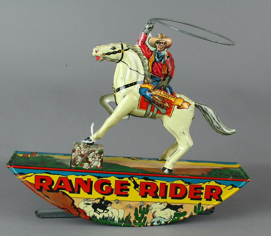 Marx Tin Range Rider Cowboy on Horseback: Marx Tin Range Rider Cowboy on Horseback. Excellent working tin toy.\r\n