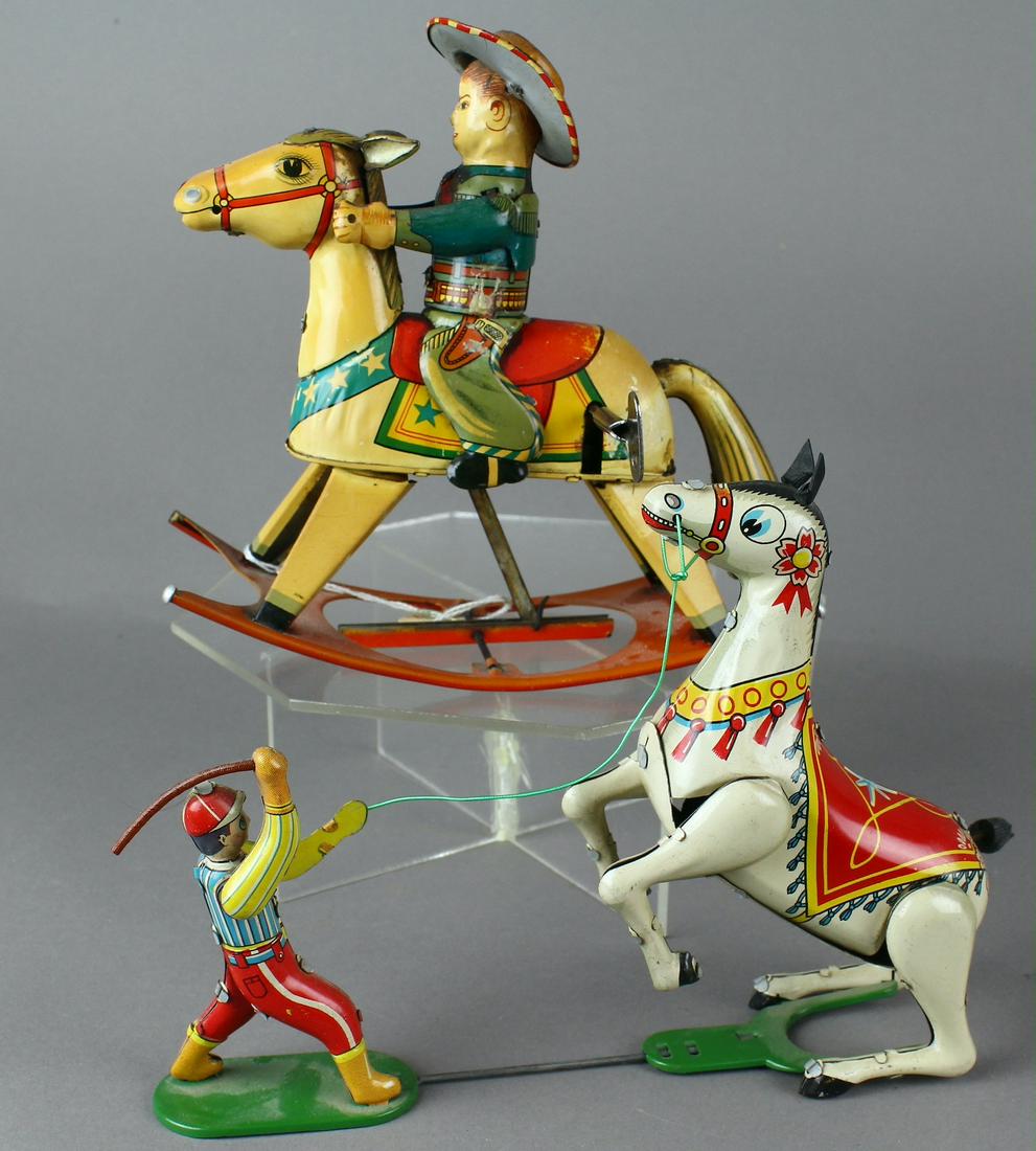 Japan Tin Circus Horse Trainer and Cowboy Rocking Rider: Japan Tin Horse Tamer- Circus Trainer and Cowboy Rocking Horse Rider. Scarce horse tamer toy 9 inches long both excellent
