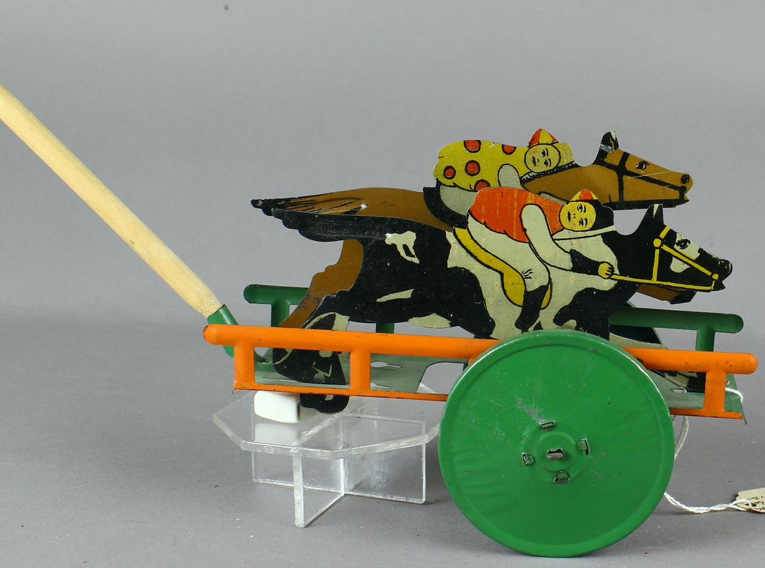 Early J. Chein Horse Racing Toy: Early J. Chein Horse Racing Toy. Great litho push toy of bobbing horse racers. Excellent tin litho 7 inches. Scarce toy.