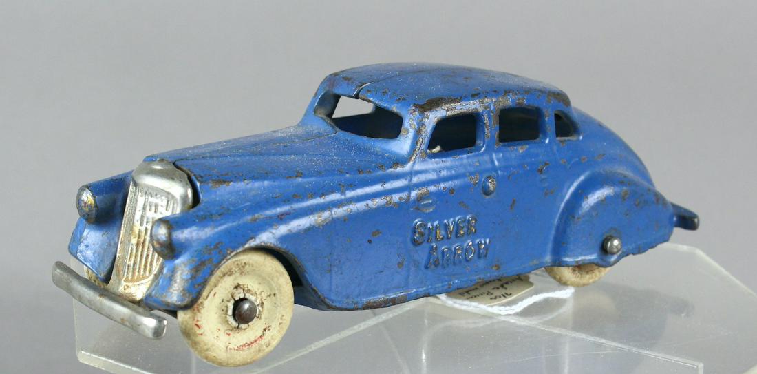 Arcade Cast Iron Silver Arrow Sedan: Arcade Cast Iron Silver Arrow 7 inches long, excellent original paint.