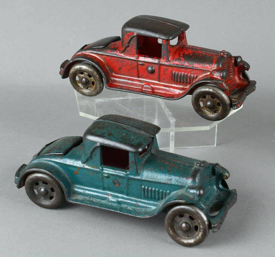 1930s AC Williams Cast Iron Rumble Seat Cars: A.C. Williams 1930 Rumble Seat Cars. Ford & Chevy both had Rumble seat coupes in the 1930s. Red car is original paint, blue is an old repaint, 6 inches long.