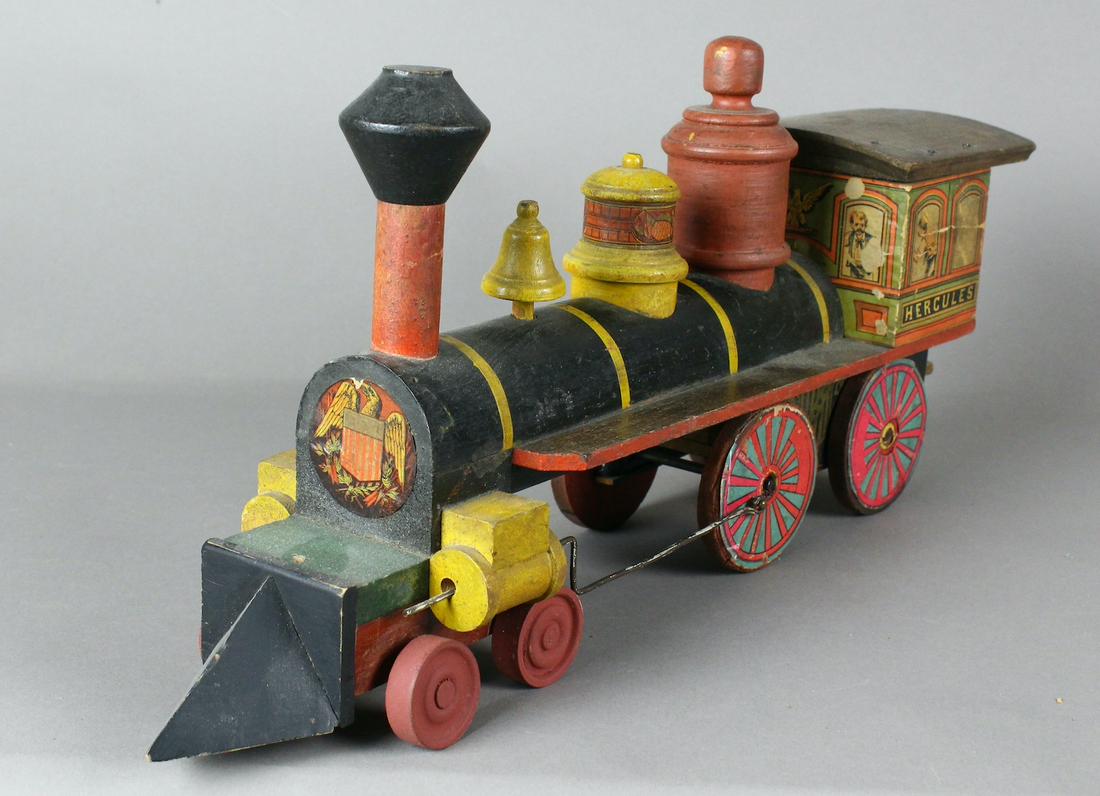 1890s Reeds Hercules Locomotive Train Engine: Reed Hercules Engine 17 inches long. Paper lithography and wood train.