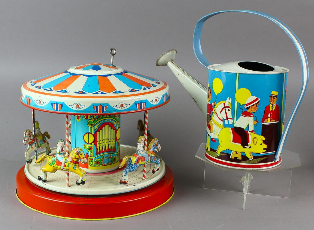 J Chein Carousel Merry Go Round & Tin Water Can: J Chein Carousel Merry Go Round 9 x 11 inches & Tin Watering can. Fine litho, watering can unmarked.