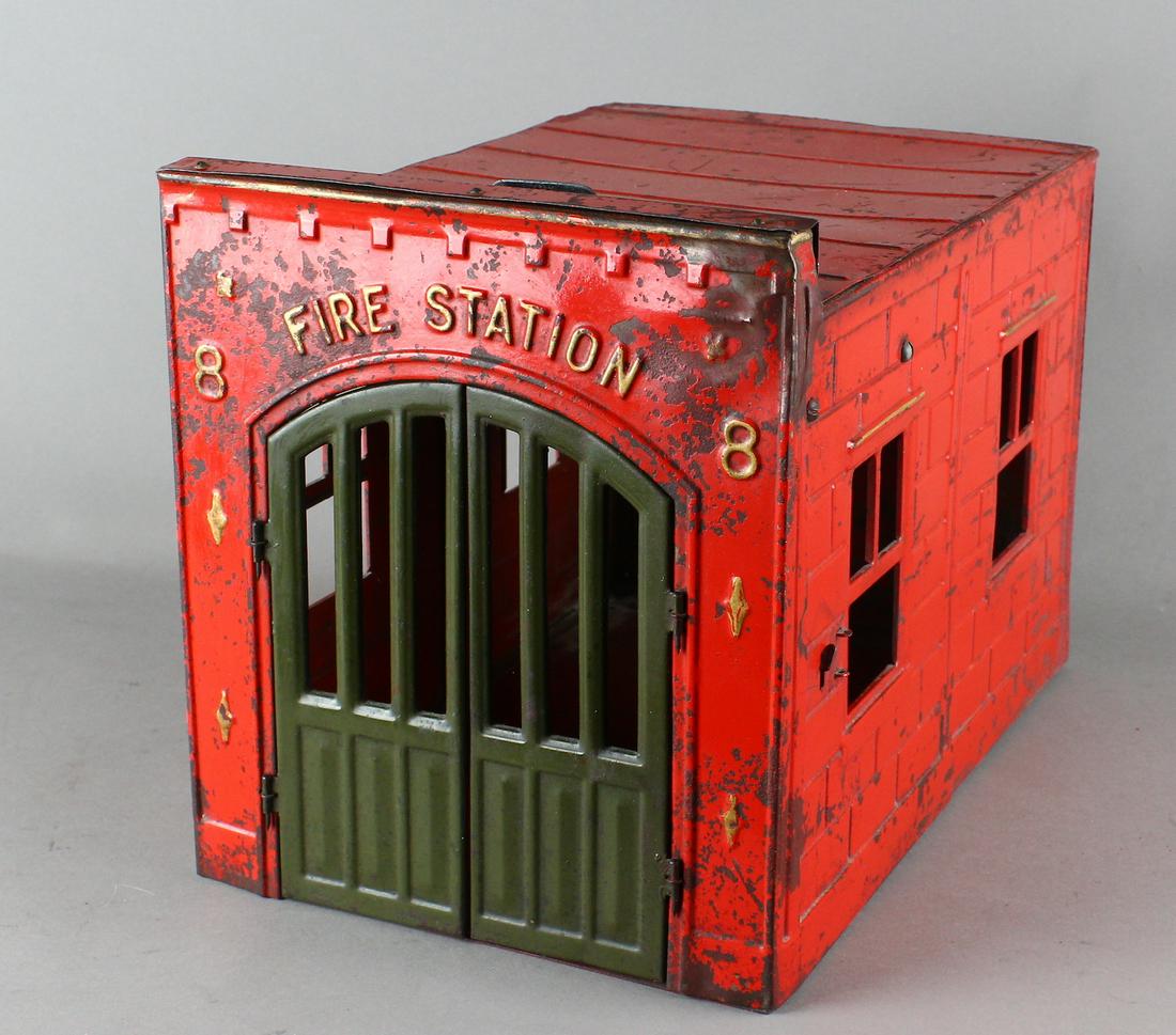 Kingsbury Fire Station 8 Firehouse: Kingsbury Fire Station 8 Firehouse. Wind up rings and opens fire doors. Original working toy pressed steel fire house, 13 inches long.\r\n