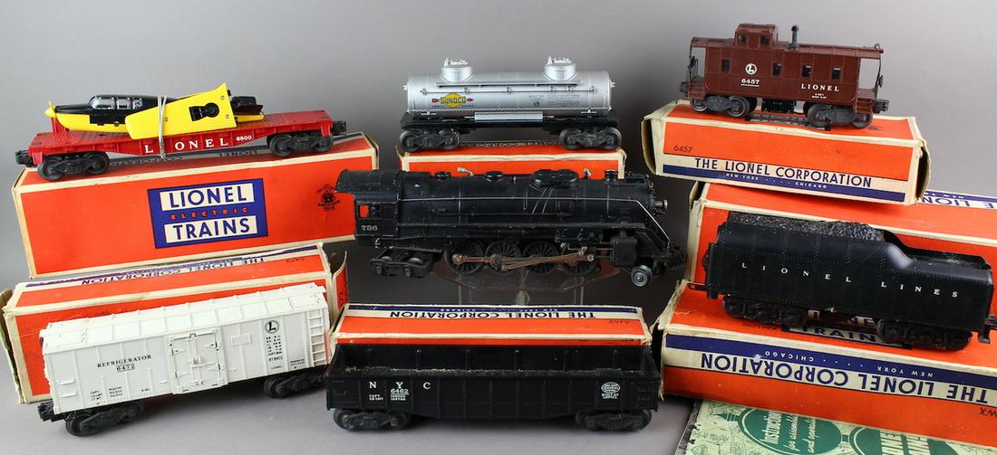 Lionel 736 Locomotive, Tender & Cars in Boxes & 6800: Lionel 736 Locomotive, Tender & Cars in Boxes. Includes 2046W Tender, 6457, 6800 Airplane (excellent) , 6462, 6472, 6415 Sunoco and boxed beacon.