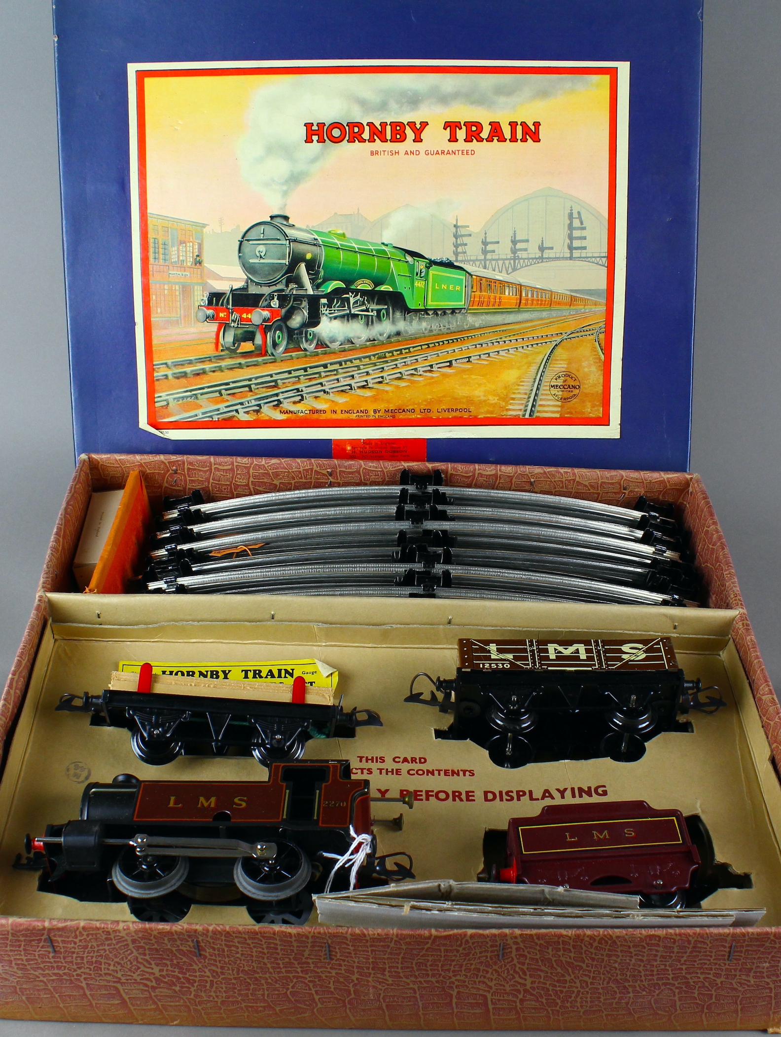 Hornby LMS Train Set Mint in Box: Hornby Train Set Mint in Box. Never used pristine tin train set. LMS Clockwork O-Gauge Train Set.