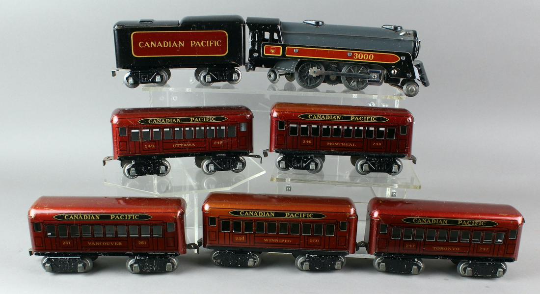 Marx Canadian Pacific Passenger Set 3000, 5 cars & Box: Marx Canadian Pacific Tin set including electric steam engine 3000 2-4-2 and 8-wheel tender, Canadian Province cars 246 247 249 250 251. Comes with Box. Excellent set.