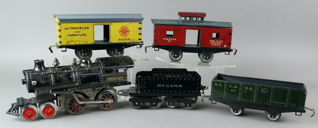 Ives 1125 Locomotive & Cars Included 641506: Ives 1125 Locomotive prewar O gauge 4-4-0 steam loco with NYC HR Tender, Gondola 63, 641506 Automobiles and Furniture Freight Car, and 67 Caboose.