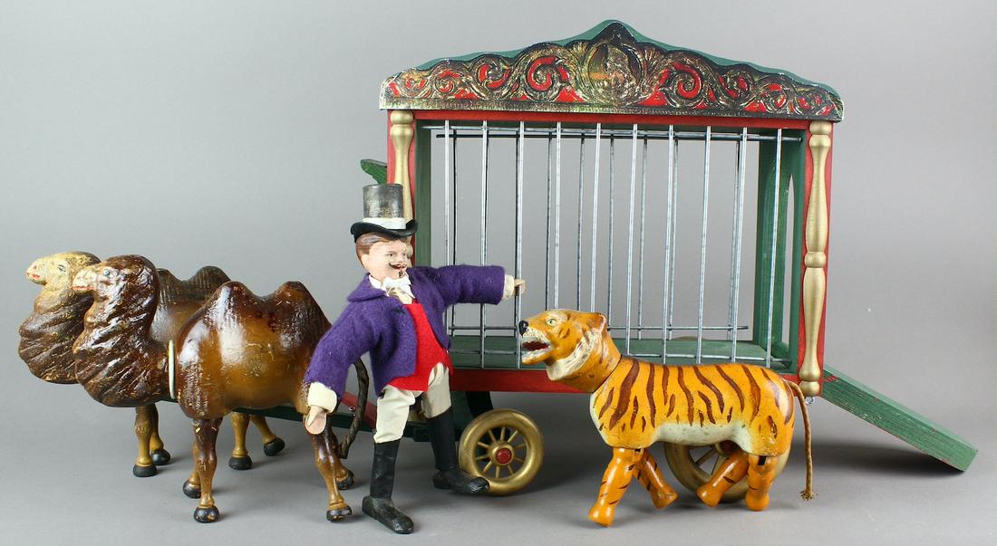 Schoenhut Circus Wagon Tiger & Lion Tamer & Bactrian camels: Schoenhut Circus Cage Wagon pulled by Bactrian camels, Tiger & Lion Tamer. Great looking group of original Schoenhut figures- lion tamer, camels and tiger along with faithfully reproduced cage wagon w