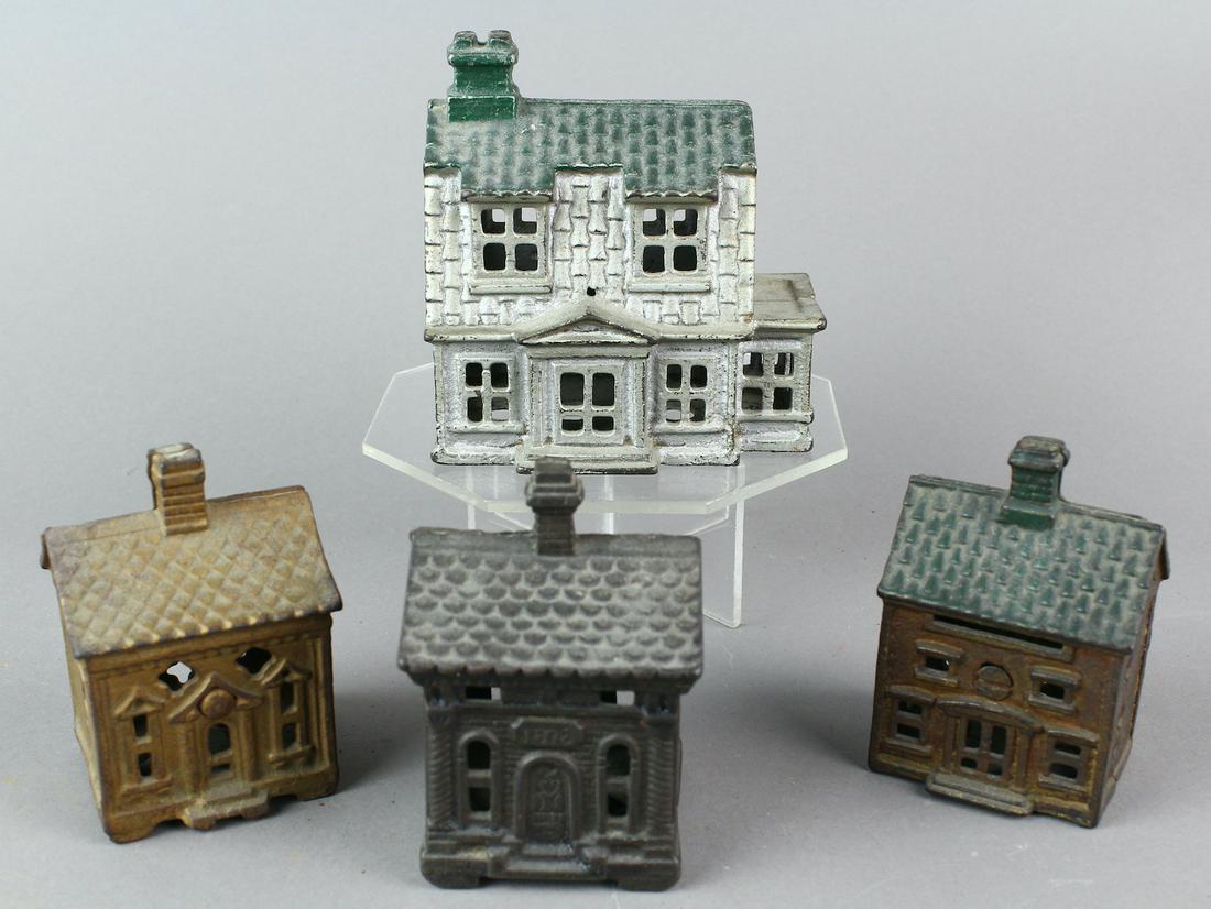 Dutch Colonial & Cottage Still Banks: Cast Iron Dutch Colonial & Cottage Still Banks. Nice original paint.