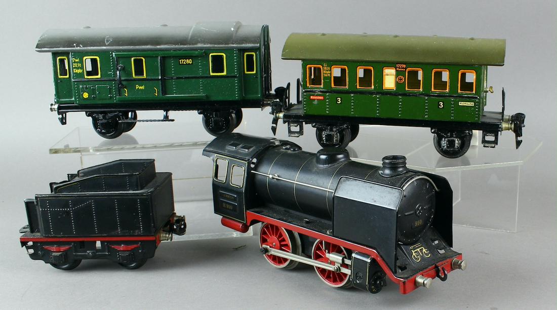 Marklin 910 Engine, Tender & Tinplate Cars: Marklin 910 O gauge 910 semi-shrouded steam locomotive and tender, & Tinplate Cars 17210 17280. Excellent set.