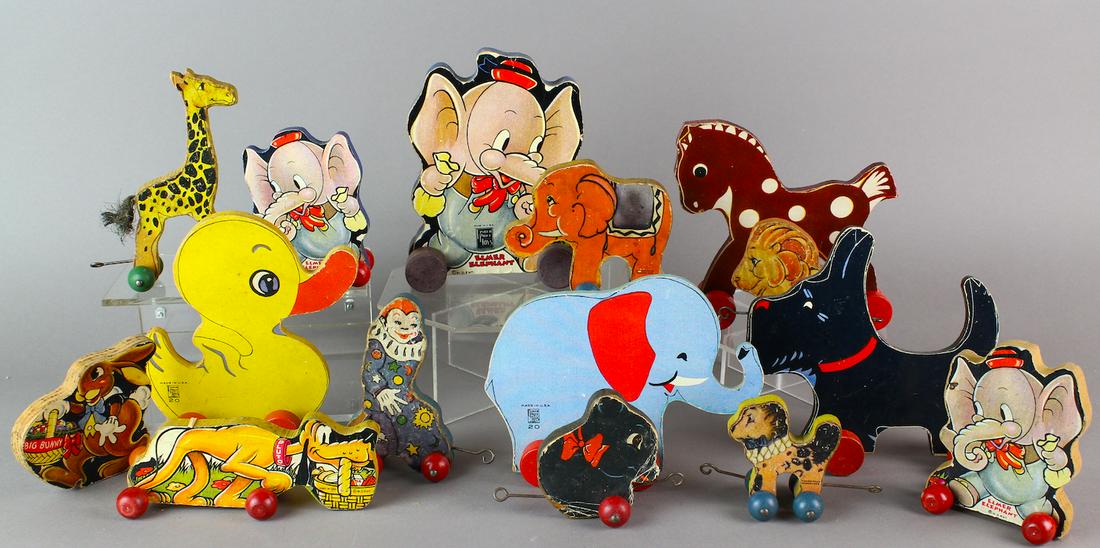 1930s Fisher Price Circus & Pluto & Elmer Elephant: 1930s Fisher Price Woodsy Wee Circus & Pluto & Elmer Elephant. 15 early small figures on wheels.